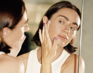 women applying vegan skincare
